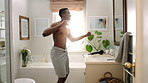 Happy, towel and bathroom with black man dancing for fun morning routine or hygiene in home. Excited, playful or male person with smile, energy or vibe for body care, fresh wash or cleaning in house