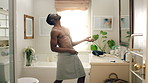 Black man, fun and playing guitar in bathroom with energy, morning routine and grooming karaoke. Male person, dancer and singing with fantasy instrument, musical performance and getting ready in home