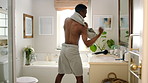 Bathroom, man and fighting in mirror with confidence for hygiene or morning routine in home. Fighter, male person or boxing with movement or reflection for cleaning, grooming or ready in house