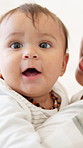Mother, baby and infant in home with love, care or bonding together for early childhood development. Woman, boy child and carry in house with family connection, trust and support for maternity leave.