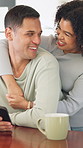 Coffee, phone and hug with couple in kitchen for bonding, reading and social media post update. Morning, connection and online news with man and woman in home for love, tea and communication