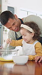 Teaching, egg and kid baking with father in kitchen for recipe preparation in family home. Mixing, cooking education or girl learning for child development with dad, man and dessert or sweat treat