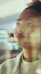 Black woman, thinking or reading with glass wall for agenda, planning or project management. Moodboard, business person and creative review in office for strategy, problem solving or research