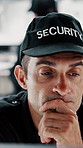 Security, man and thinking in control room for surveillance, observation or safety compliance. Protection service, serious or person with technology for crime prevention, guard job and supervision