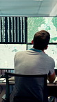 Screen, weather and back of people with map for environmental data, forecast and research. Meteorology, office and man on monitor with satellite info, climate patterns and geospatial surveillance
