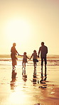 Walking, parents and girls holding hands for beach sunset, family holiday and weekend travel trip. Back, people and children with support for seaside vacation, mockup space and bonding on journey