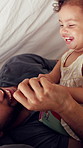 Tent, father and playful with toddler in home for bonding together, game and connection with toy. Book, man and fun activity with child in blanket fort for relationship, love or care for development