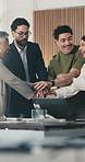 Happy people, hands and stack for success at office meeting, support or goals at finance company. Group, team and excited for celebration, motivation or applause for announcement at investment agency