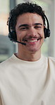Face, headset and man in call center for telemarketing, lead generation and about us in office. Smile, portrait and sales consultant in workplace for telesales, outbound marketing and confidence
