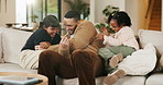 Dad, girl and tickle with children on sofa for play, bonding or love with connection in living room. People, father and kids with games, laugh and fun on couch, joke or relax at blended family house