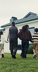 Holding hands, outdoor and back of family by new home with bonding, love and connection together. Walk, support and children with parents in backyard for property investment, real estate or mortgage.