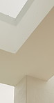 Ceiling, sky and architecture in home with roof, interior or minimalistic design for building. Modern aesthetic, white wall and shaft with window in house with natural light for property development.