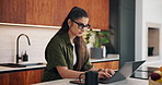Remote work, woman and typing on laptop in kitchen for story editing, draft feedback or phone alert. Freelancer, editor and tech in home for proofreading, article grammar or check mobile notification