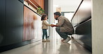 Dad, holding hands and discipline with child in kitchen for conversation, guide or warning in home. People, father and girl with talk, listen and learning with behavior with care in family house