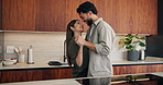 Couple, dancing and happy for holding hands in kitchen with relationship, connection and love in home. People, partner and smile with rhythm, care or trust with movement for bonding at apartment