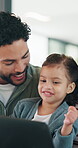 Father, child and technology for elearning in family home with education app, knowledge or IQ quiz. Happy man, pointing and daughter with computer for speech therapy, interactive and language game