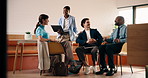 Team, meeting and people in cafe on tech for discussion, project strategy and business plan. Coffee shop, creative and men with women talking on laptop, research and brainstorming for campaign ideas