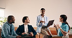Coffee shop, laptop and woman with team for meeting, project strategy and marketing idea. Cafe, creative and business people on tech in discussion for campaign, feedback and proposal for startup