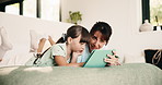 Mother, girl and tablet on bed with smile, relax and movie choice with streaming service in home. People, mom and child with tech, happy and bonding with love, film or subscription at family house