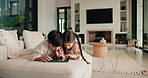 Happy, siblings and children on sofa with tablet for online games, internet and playing together. Family, home and boy with girl on digital tech for entertainment, videos and bonding on weekend