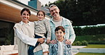 Happy, outdoor and face of family by new home with bonding, connection and property ownership. Smile, love and portrait of children with mother and father in backyard together at house for mortgage.