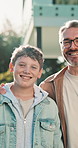 Happy, dad and face with child for real estate, property investment or security together. Portrait, father and son with smile, house or support for new home, safety or outdoor bonding in backyard
