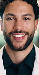Face, man and doctor with ambition for healthcare, pride and career confidence in hallway. Smile, physician or medical professional with portrait for about us, management and support in hospital