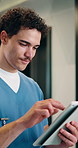 Man, tablet and nurse with healthcare planning, typing or reading of records, schedule or admin. Medical, tech and person with smile for online results, telehealth or digital app in clinic hallway