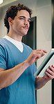 Doctor, tablet and man thinking with medical results, diagnosis or treatment with smile. Solution, idea and healthcare worker typing on digital app for schedule, telehealth or planning in hospital