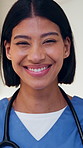 Nurse, face and woman with smile for healthcare, cardiology specialist and career ambition. Physician person, portrait and mask in hospital for wellness, medical service and pride or about us