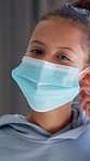 Face, child and remove mask at house for safety, health protocol and infection prevention. Portrait, kid and hantavirus isolation for healthcare compliance, medical precaution and pandemic quarantine
