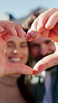 Happy, couple and face with heart hands for love, outdoor bonding or romance together. Portrait, man and woman with smile, like emoji or shape for romantic gesture, care or relationship in home