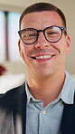 Optometry, face or man in office with glasses, optical lenses or prescription results for vision. Healthcare, happy or corporate employee with laugh, eye wellness or eyewear choice in ocular care.