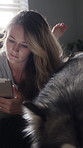 Pet, home and woman with tablet on bed, entertainment or reading ebook with subscription on website. Novel, online and person with searching story in bedroom, chilling and bonding with dog on weekend