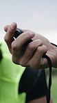 Coach, field and men in training with stopwatch to prepare for match, competition and sports game. Rugby, team and people with timer for exercise, workout and warm up for fitness, practice and skills