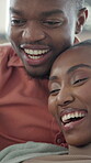 Couple, online and relax in lounge, laughing and bonding with partner on weekend, love or connection. Happy, black people and streaming funny videos on website, talking and watching comedy in home