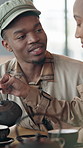 Date, happy and black couple in cafe for conversation, talking and bonding in coffee shop. Morning, diner and man with woman with drink, teapot and discussion for relationship, love and connection