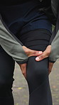 Fitness, hands and person with knee pain outdoor, massage injury and muscle tension after exercise. Sore legs, runner and man with sprain, training accident or joint inflammation with arthritis