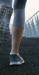 Fitness, athlete and legs on bridge with running, cardio or stamina exercise in physical activity. Training, back or female person outdoor with jog, sports hobby or urban workout in Australia.