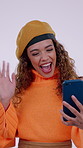 Phone, wave and woman with video call in studio, online communication and greeting for networking. Connection, mobile or happy person with hello for virtual conversation, laughing or white background