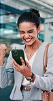 Fist pump, happy and businesswoman with phone in glass office with win, profit or approval on investment. Excited, cellphone and financial manager with celebration for achievement in workplace.