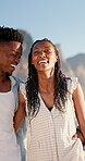 Couple, hug and bonding on holiday, walk and travel with partner for anniversary celebration or date. Outdoor, black people and embrace with spouse on special event, laughing and support on vacation