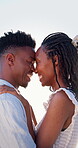 Couple, hug and love on holiday, romance and travel with partner on date or anniversary celebration. Outdoor, black people and happy on special event, flare and forehead touch with spouse on vacation