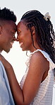 Couple, hug and smile on holiday, romance and travel with partner on date or anniversary celebration. Outdoor, black people and laugh on special event, love and forehead touch with spouse on vacation