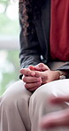 Mental health, group therapy or hands in office with nerves, anxiety trigger or memory of trauma. Worry, employee or person with depression, overthinking or emotional stress in counseling session.