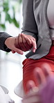 Mental health, group therapy or people in office with holding hands, empathy or support in workplace. Security, bokeh or employee with sympathy, trust or colleague understanding in counseling session