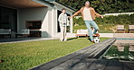 Soccer, goal and father with child in backyard by home for practice, bonding or sports game. High five, football and dad with boy kid outdoor for training, connection or match together by house.