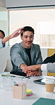 Business, man and handstack in meeting with staff, good news and celebration of finance funding. Smile, people and huddle in office with applause, audit success and teamwork for financial achievement