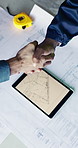 Handshake, tablet screen and men with blueprint for construction, planning and building project. Architecture, agreement and above of people with layout on tech for remodeling, engineering or meeting