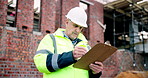 Clipboard, checklist and man on construction site for task brief, inspection or safety update. Writing, management and mature engineer with paperwork, report or project coordination for renovation